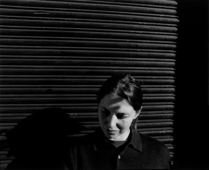 A black and white photograph of Barbara Wesołowska at her east London studio