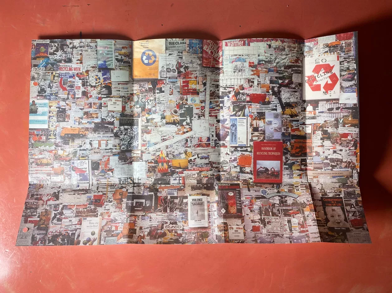 A photograph of a folded out page from Michael Landy's Break Down, a montage of images of his belongings