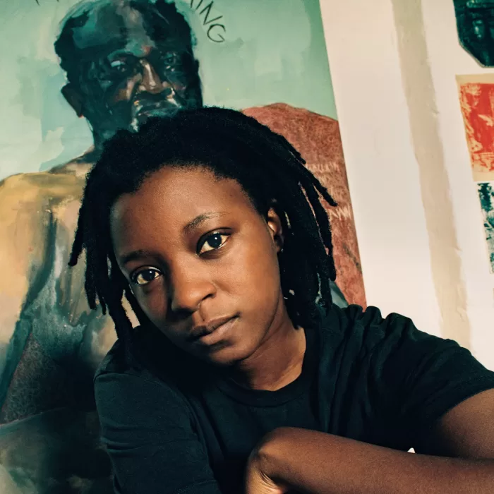 A photograph of Kudzanai-Violet Hwami in her studio