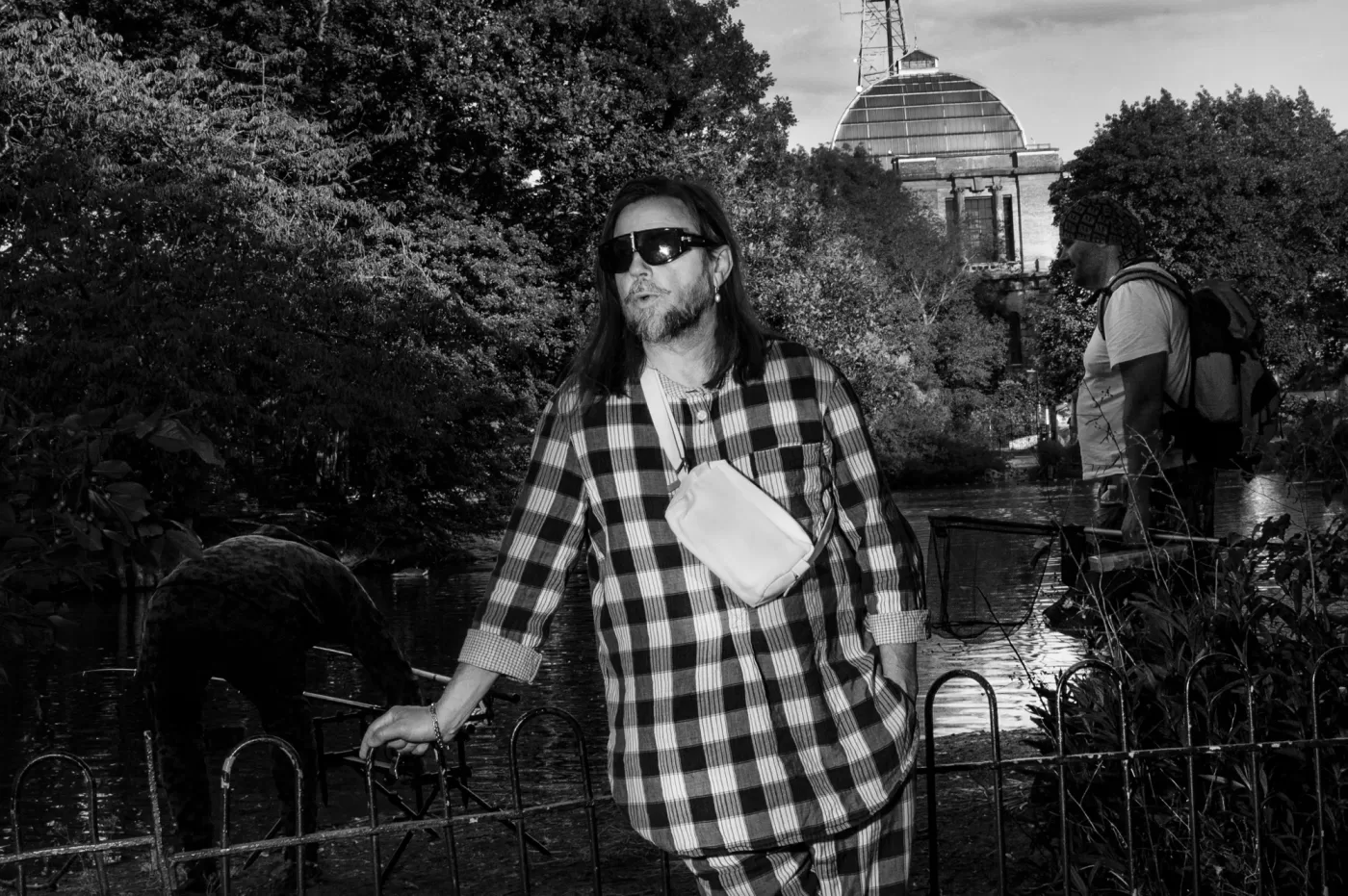 A black and white photograph of Mark Leckey at Alexandra Palace Park, London