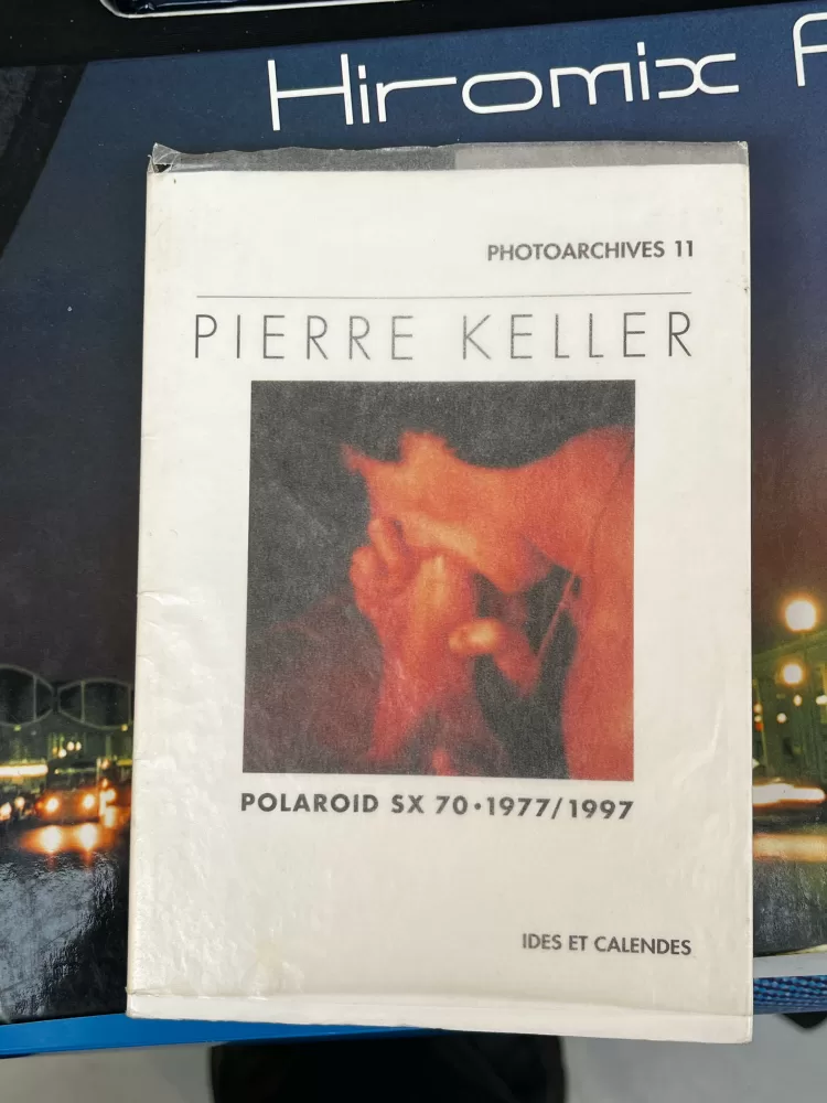 A photograph of the cover of Pierre Keller's 'Polaroid SX 70, 1977-1997, Photoarchives 11'