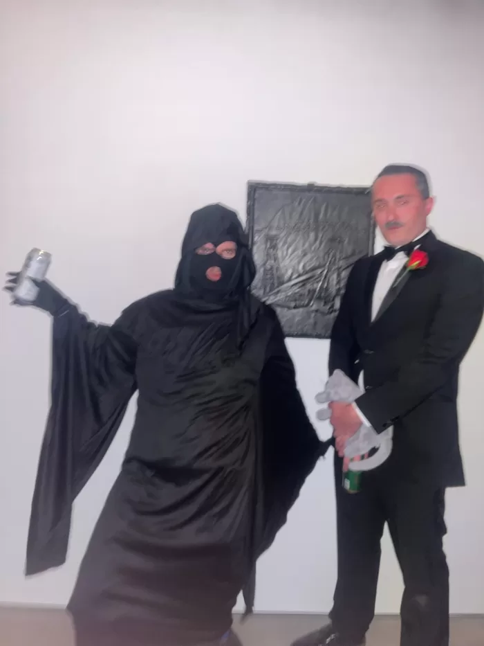 A photograph of a two people in costumes at Soup Gallery's Halloween party in London