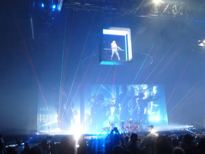 Madonna photographed ascending from the stage on a cube