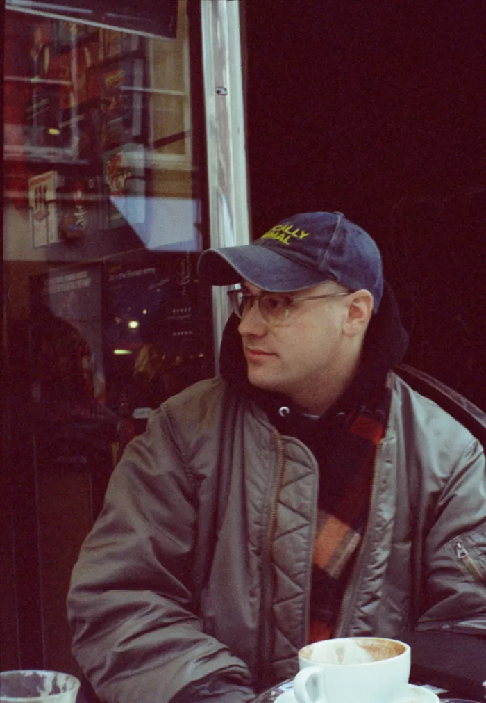 Joshua Leon photographed sitting outside Bar Italia