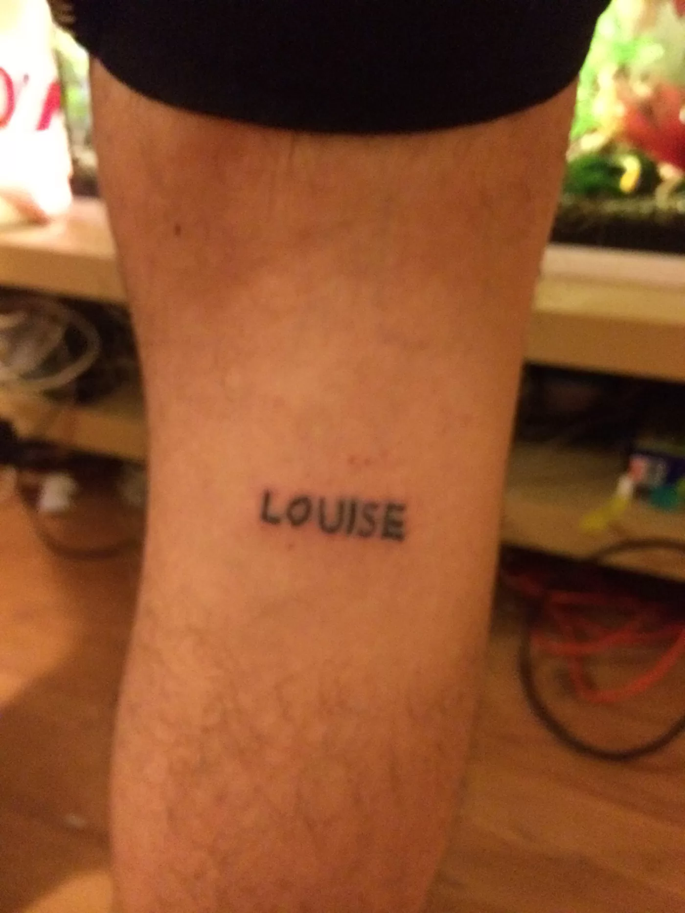 'Louise' tattooed on the leg of a friend of Louise Giovanelli