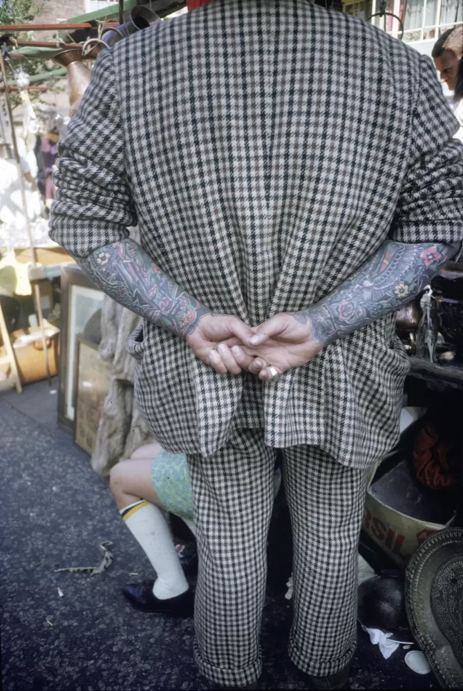 Joel Meyerowitz photograph of a man's tattooed arms in London, 1966