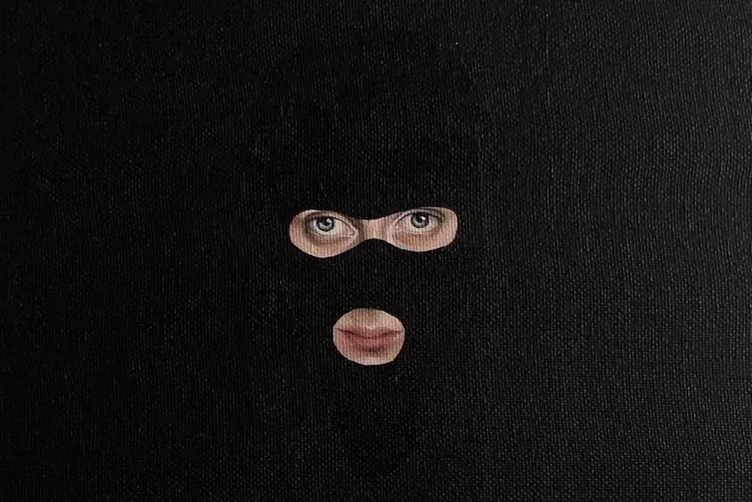 Ada Bond oil painting of a woman in a balaclava